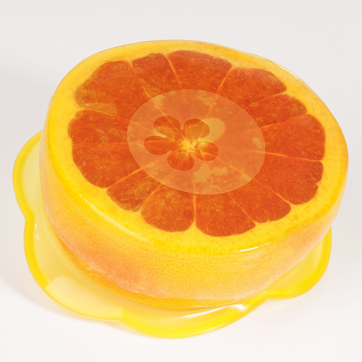 Runde transparente Abdeckung mit grapefruit-motiv und gelbem Rand.
